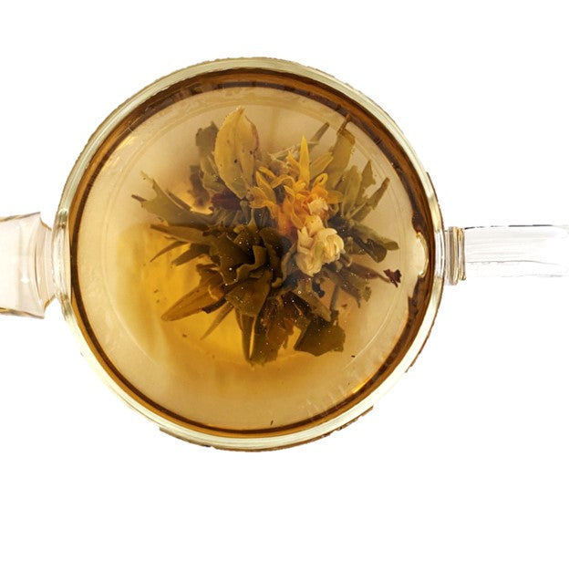 Flowering tea with peach and white flowers