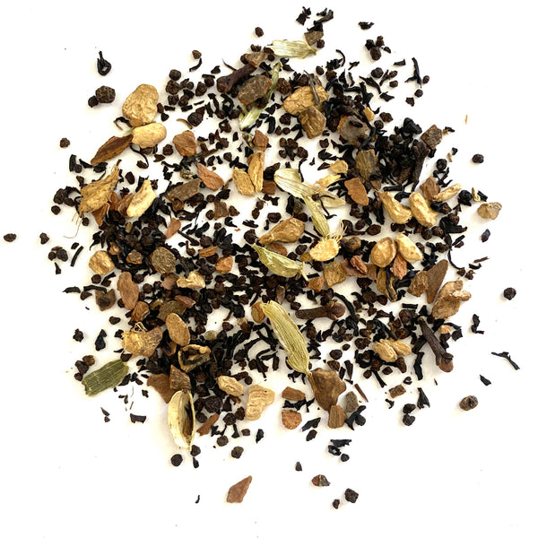 Black tea, pepper, cloves, ginger, cinnamon, cardamom with spice/vanilla flavor.