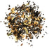 Black tea, pepper, cloves, ginger, cinnamon, cardamom with spice/vanilla flavor.